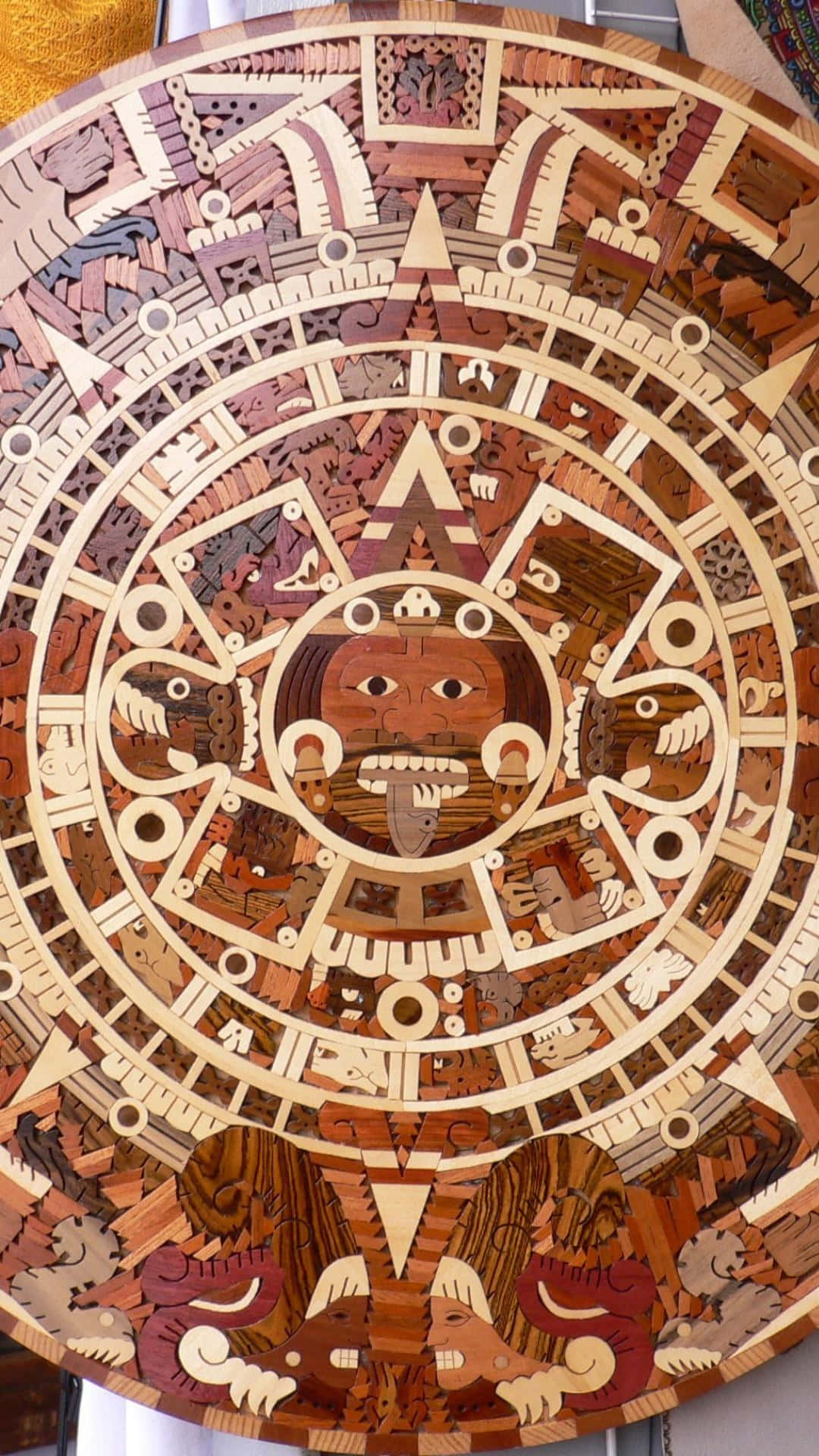 A Powerful Aztec Warrior Standing Proud And Ready. Background