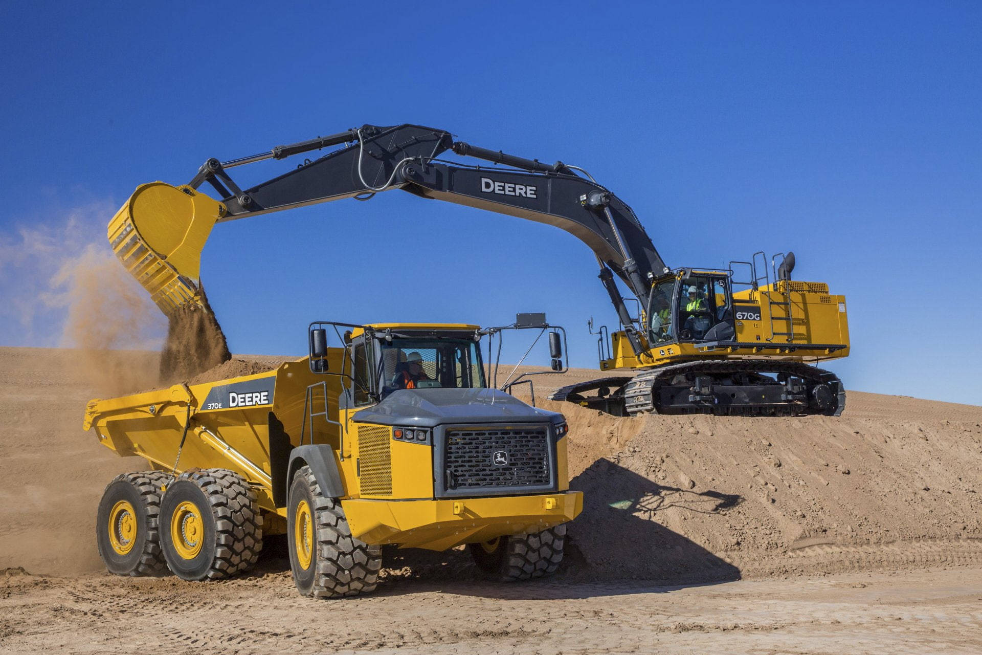 A Powerful John Deere Dump Truck And Excavator Working On A Construction Site