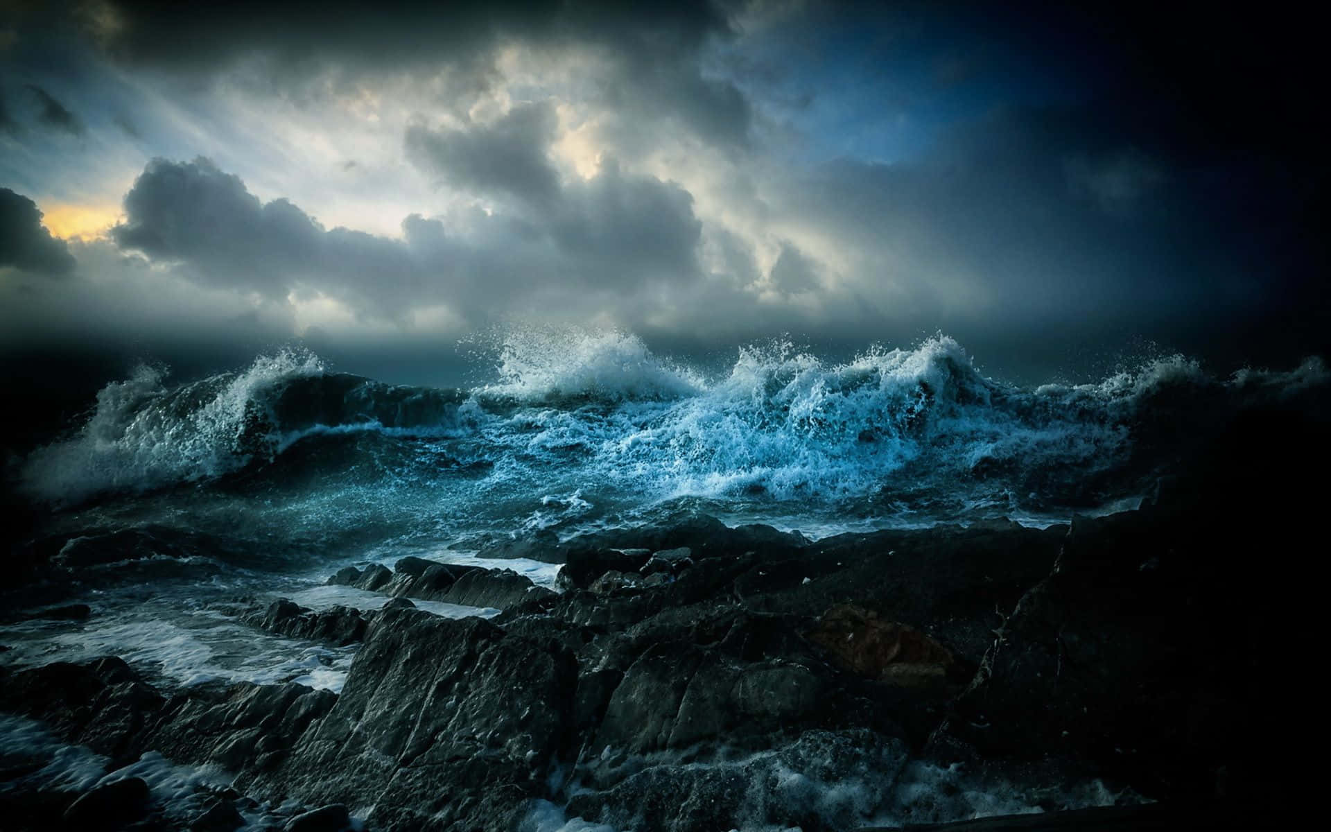 A Powerful Ocean Storm Churning Over The Horizon Background