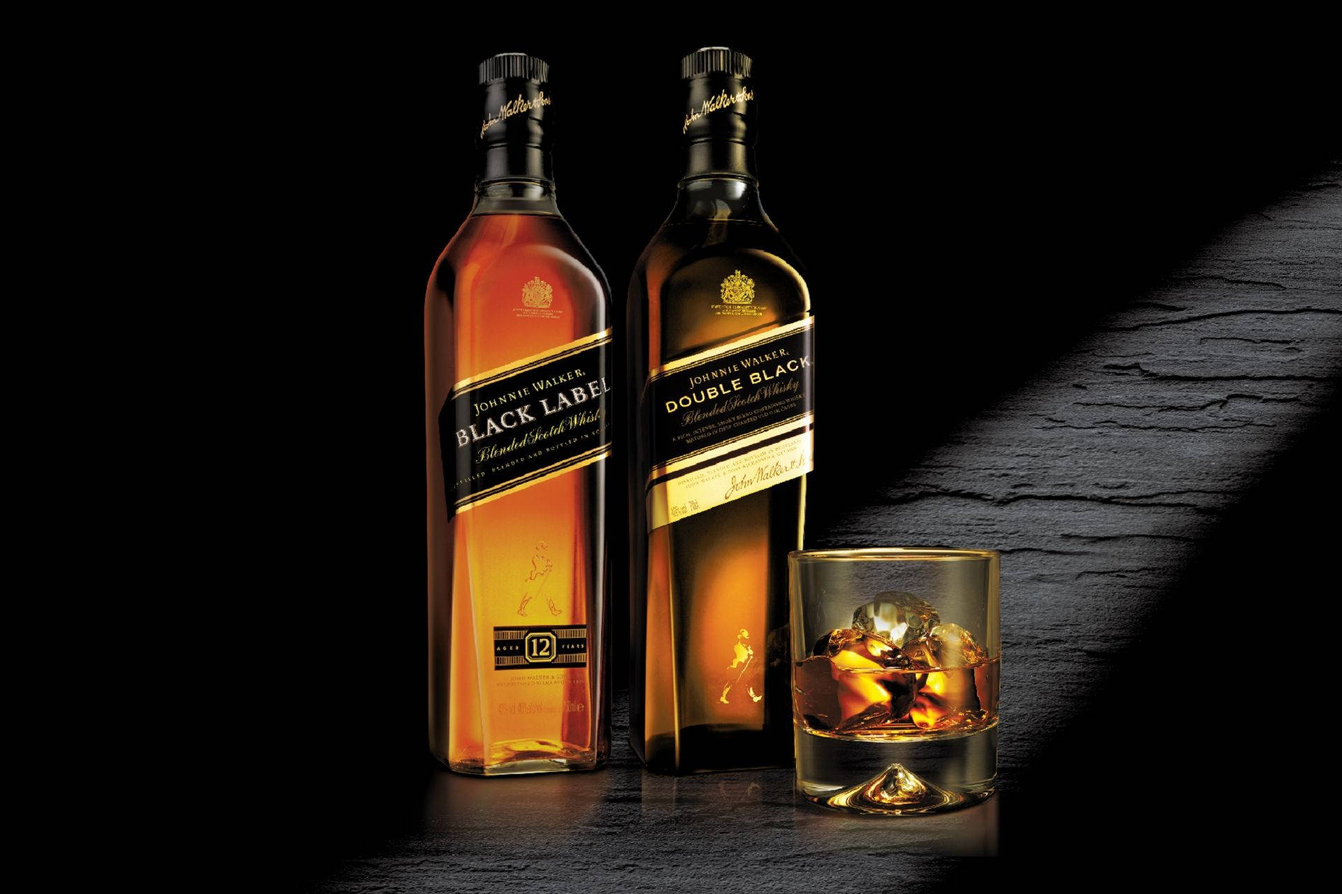 A Premium Pour Of Johnnie Walker In A Classic Lowball Glass Background