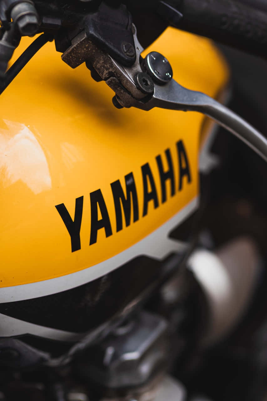 A Premium Yamaha Motorcycle Illuminated At Night