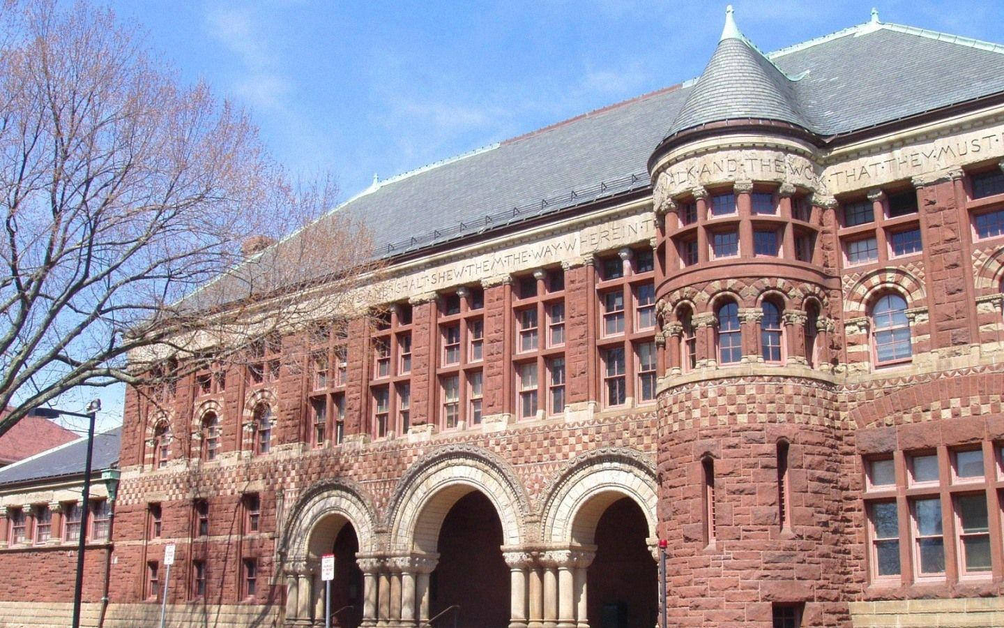 A Pristine View Of Austin Hall At Harvard University During Daytime Background