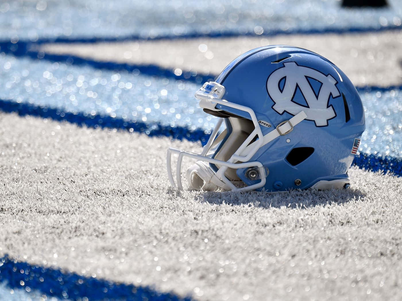 A Proud Unc Student Cheering On The Tar Heels Background