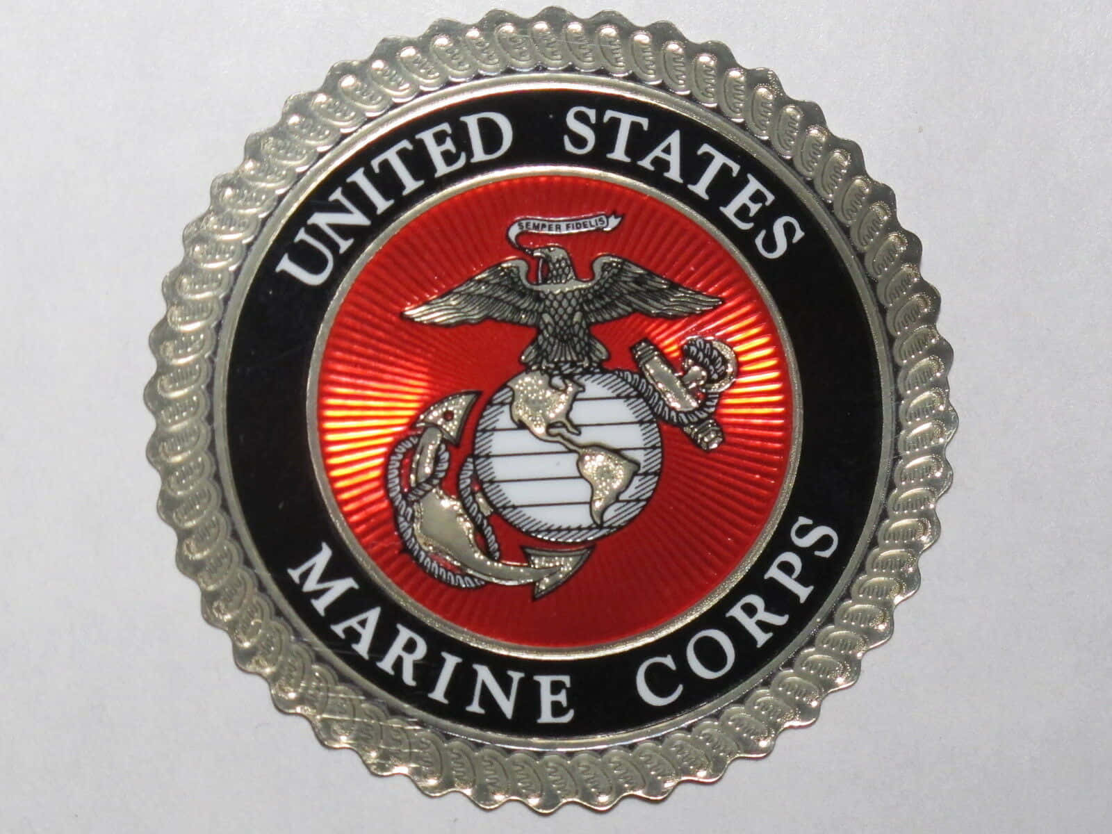 A Proud Us Marine Stands Tall In His Uniform. Background