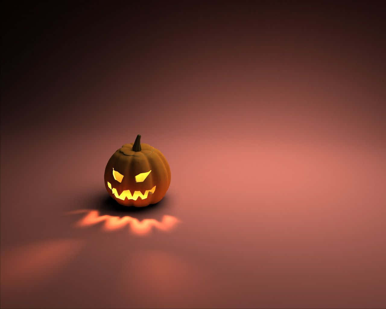 A Pumpkin Is Lit Up On A Dark Background