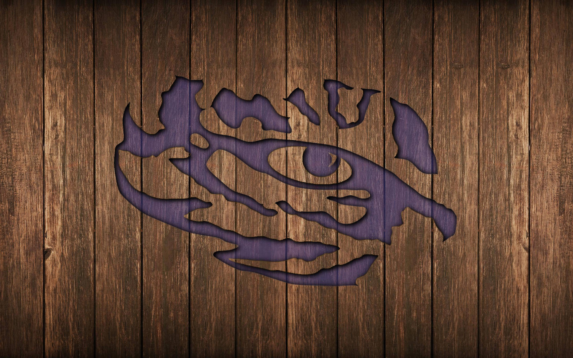A Purple Logo On A Wooden Background Background