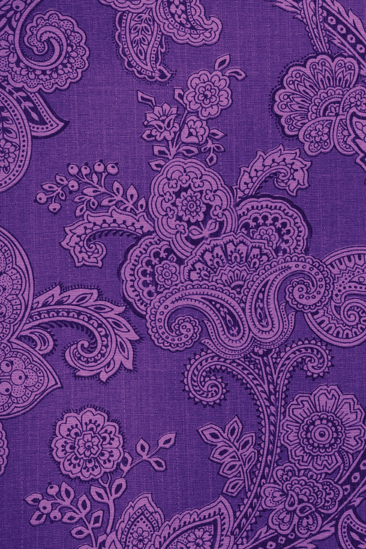 A Purple Paisley Pattern On A Fabric