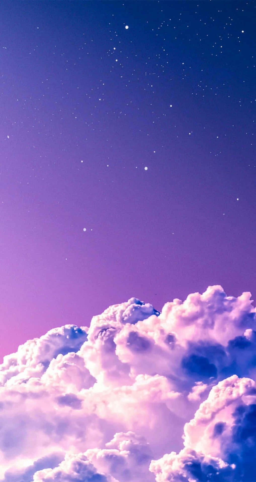 A Purple Sky With Clouds And Stars Background