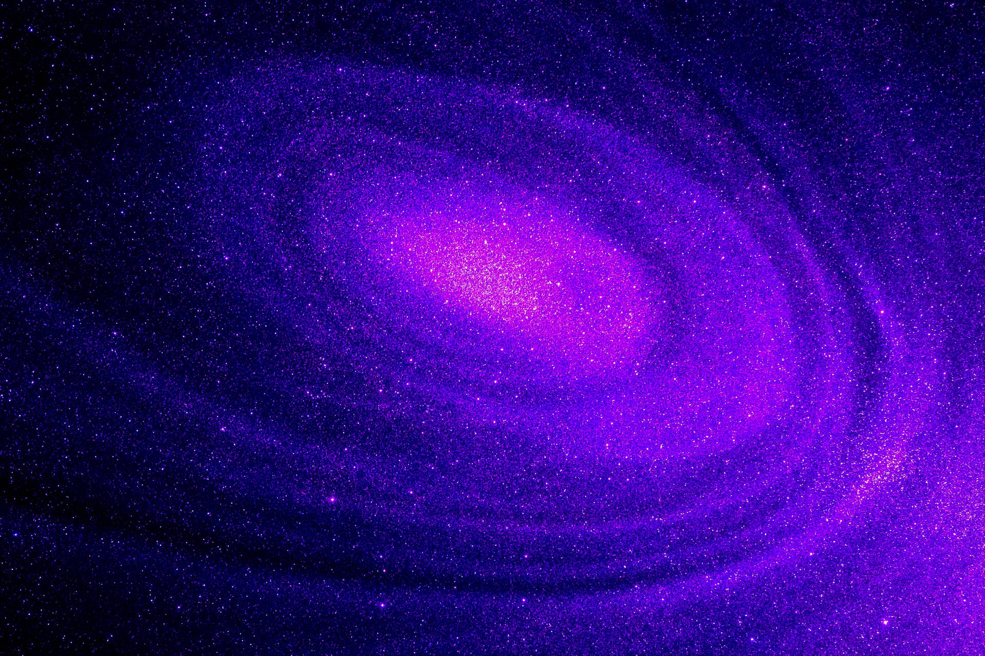 A Purple Spiral Galaxy With Stars In The Background Background