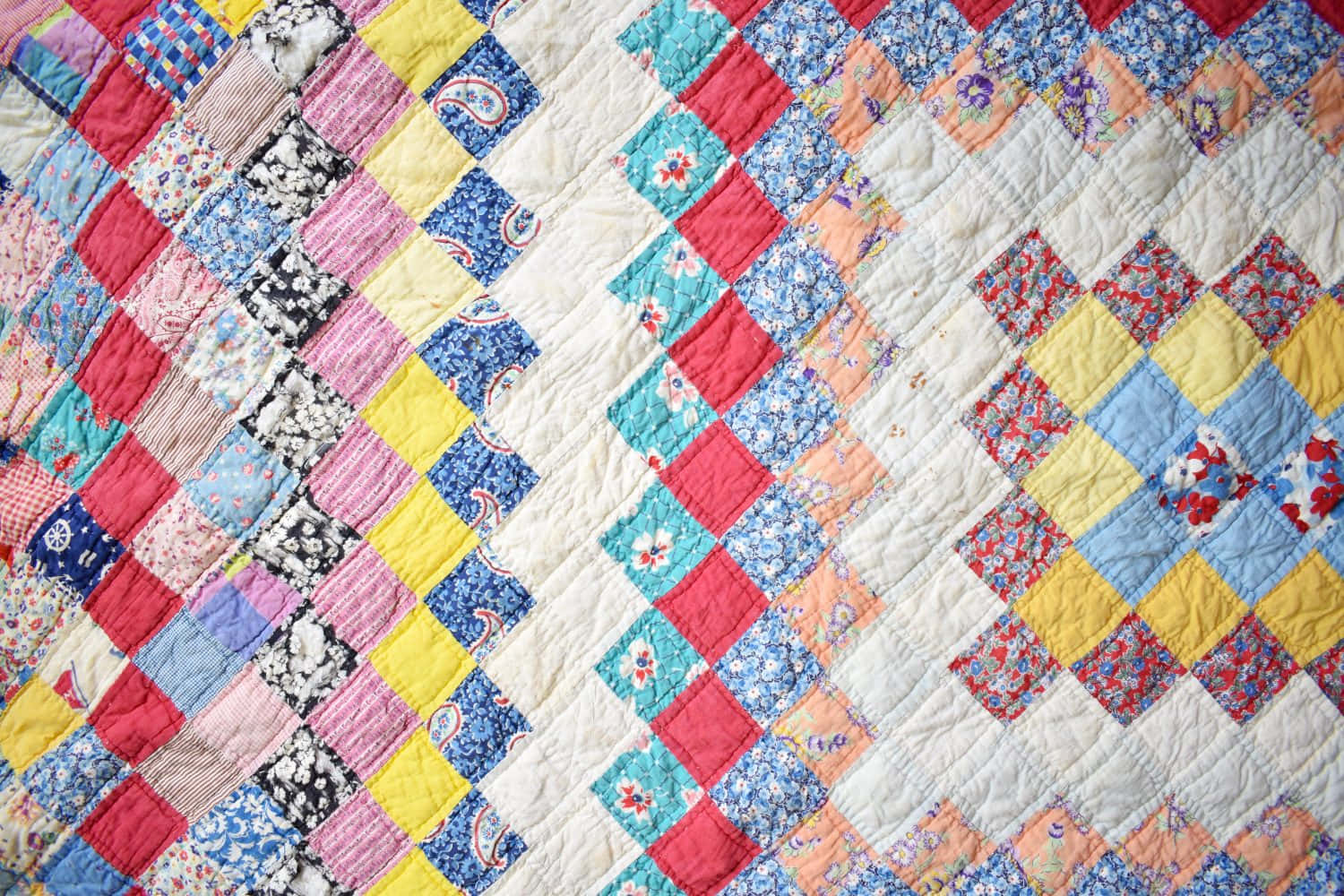 A Quilt With A Colorful Pattern