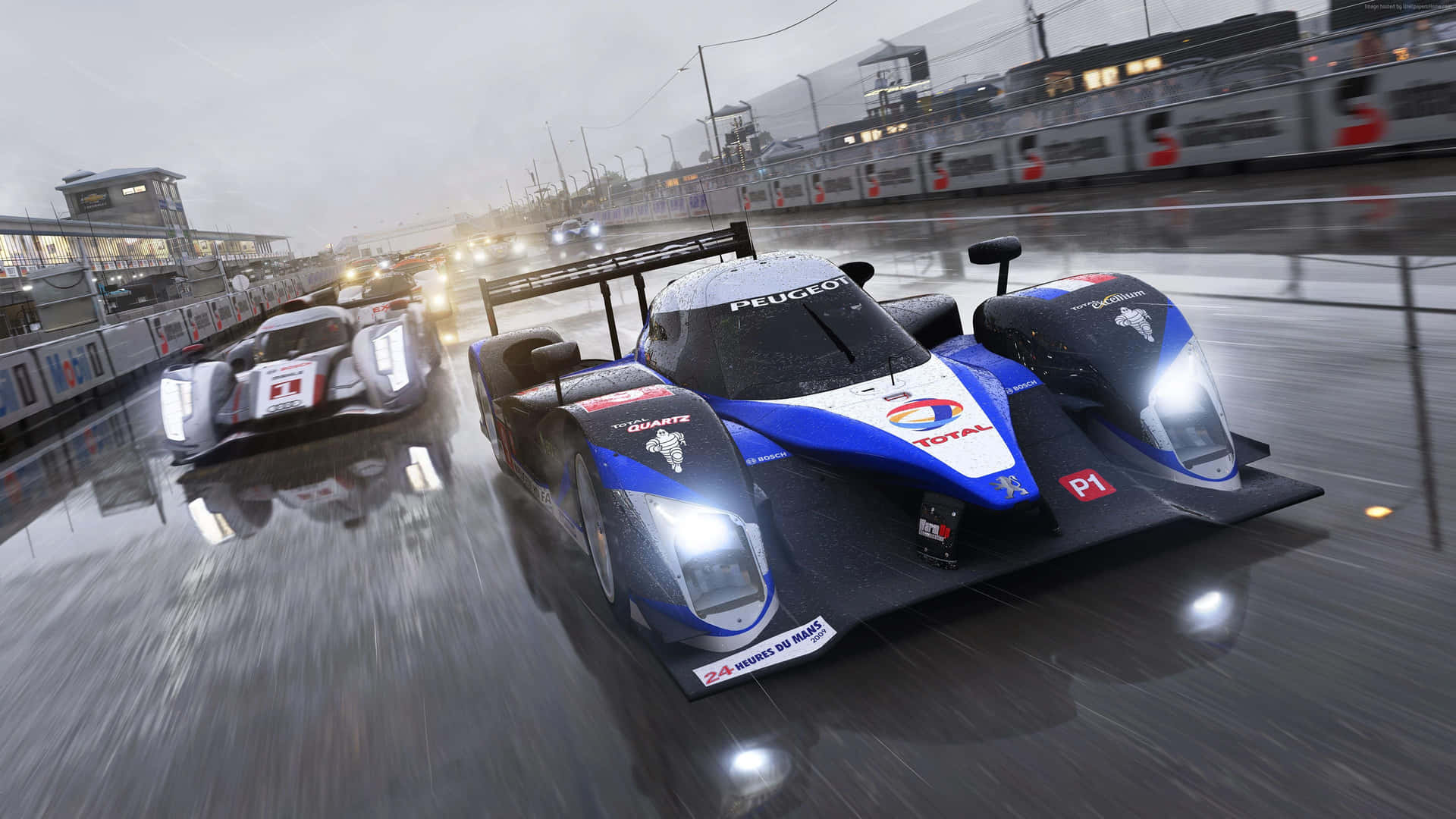 A Race Car Driving Down A Wet Road Background