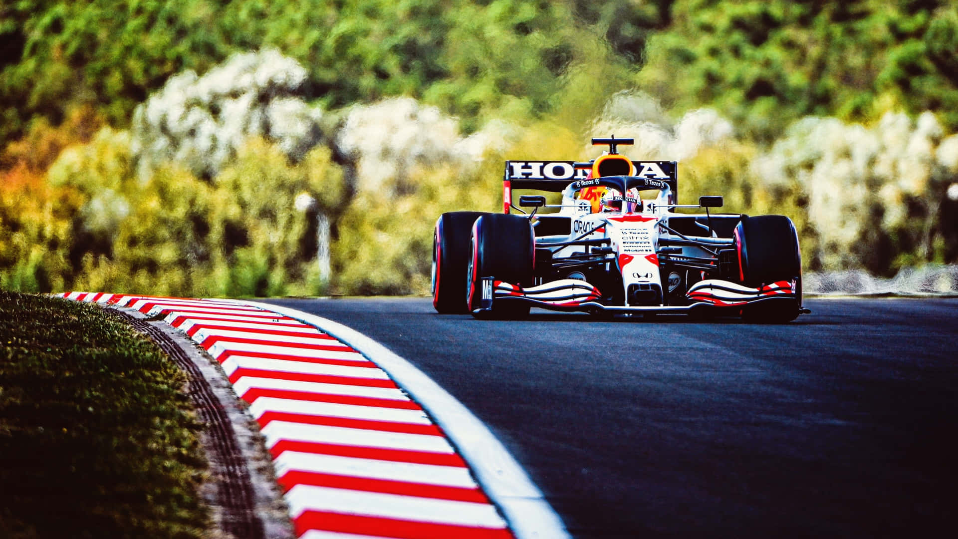 A Race Car On A Track Background