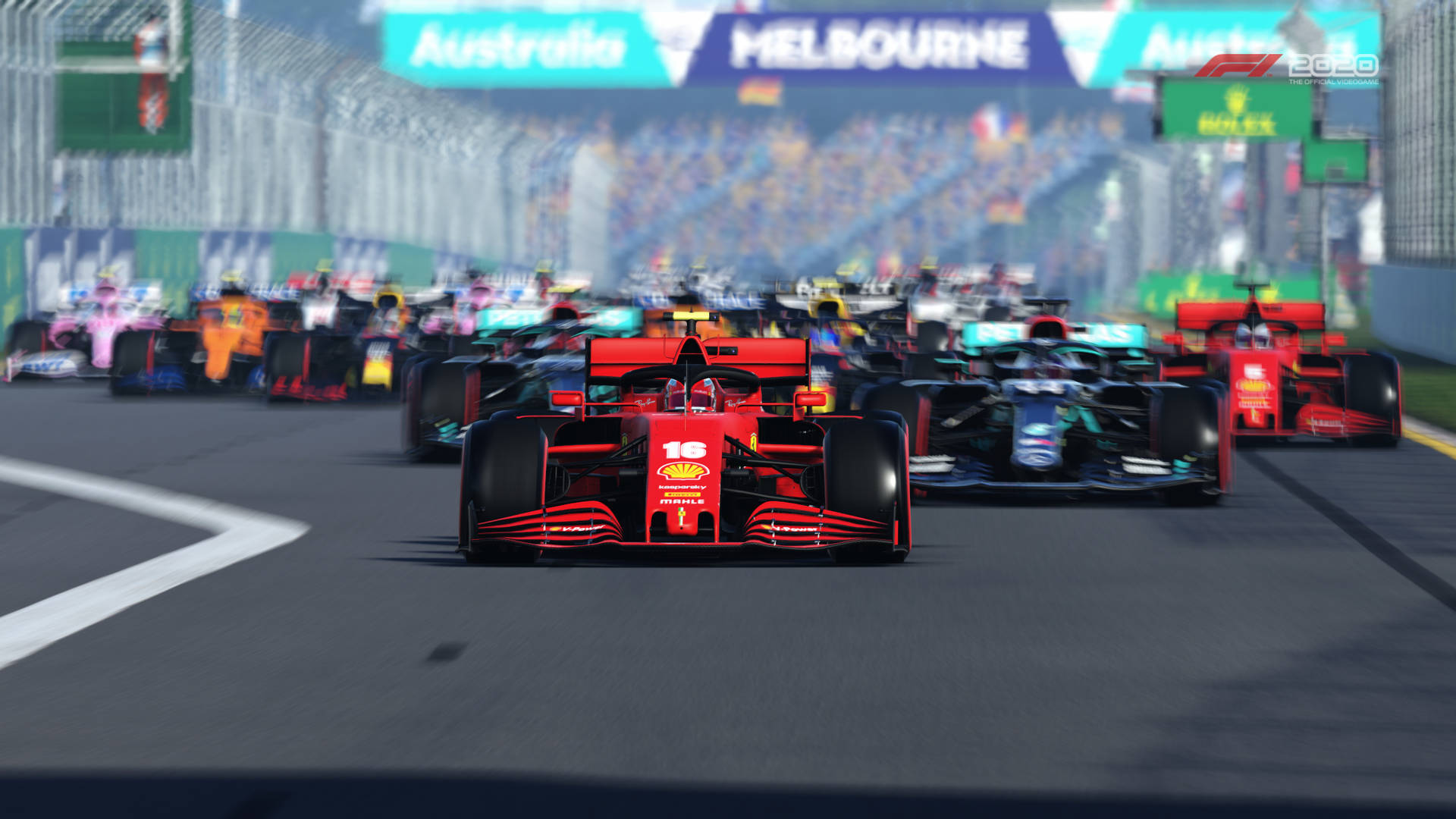 A Race Track With Many Cars Racing In Front Of A Crowd Background