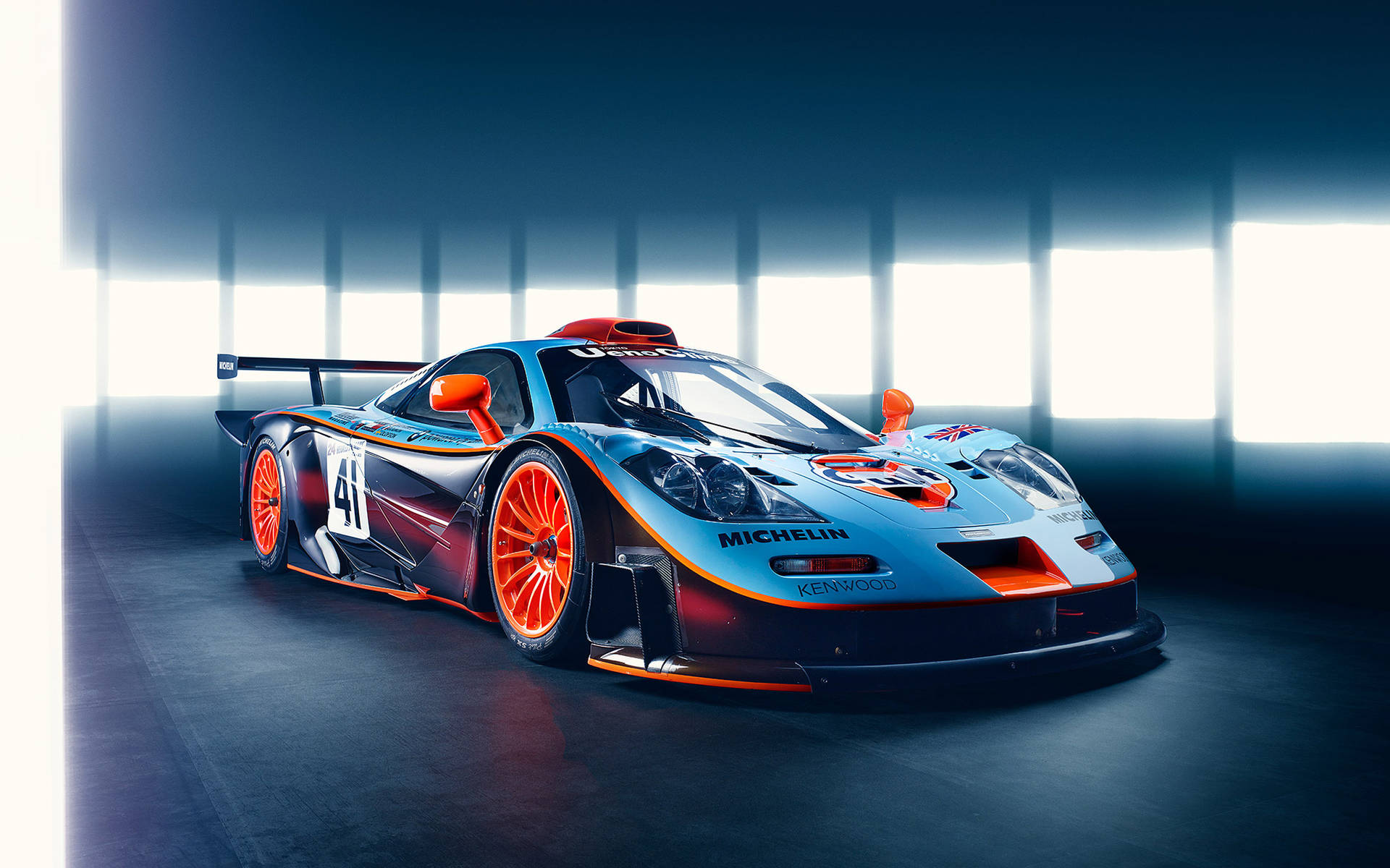 A Racing Car In A Dark Room Background