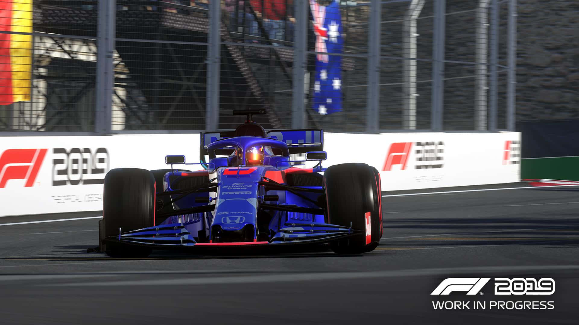 A Racing Car Is Driving Down A Track Background