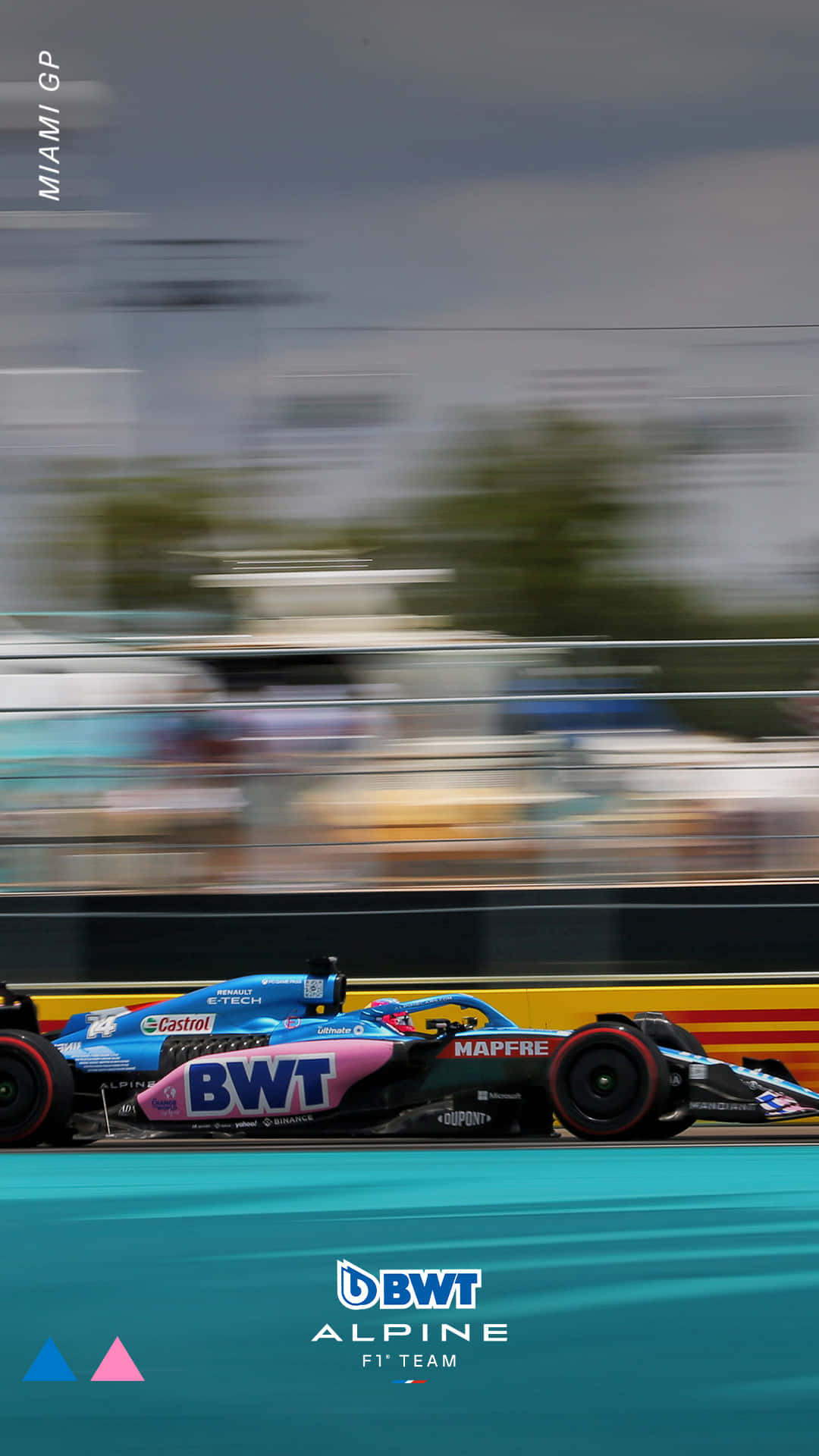 A Racing Car On A Track With Blurred Background Background