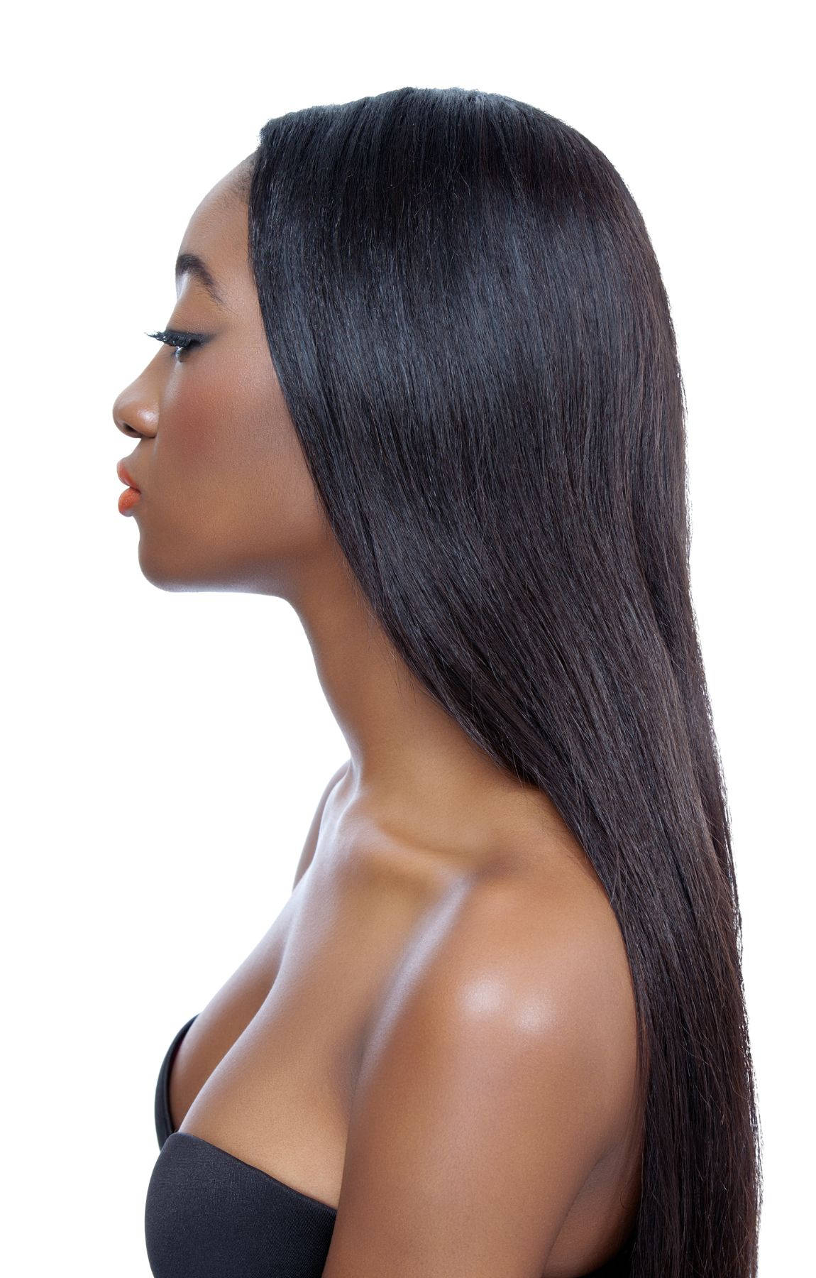 A Radiant African Woman Showcasing Her Long, Silky Hair. Background