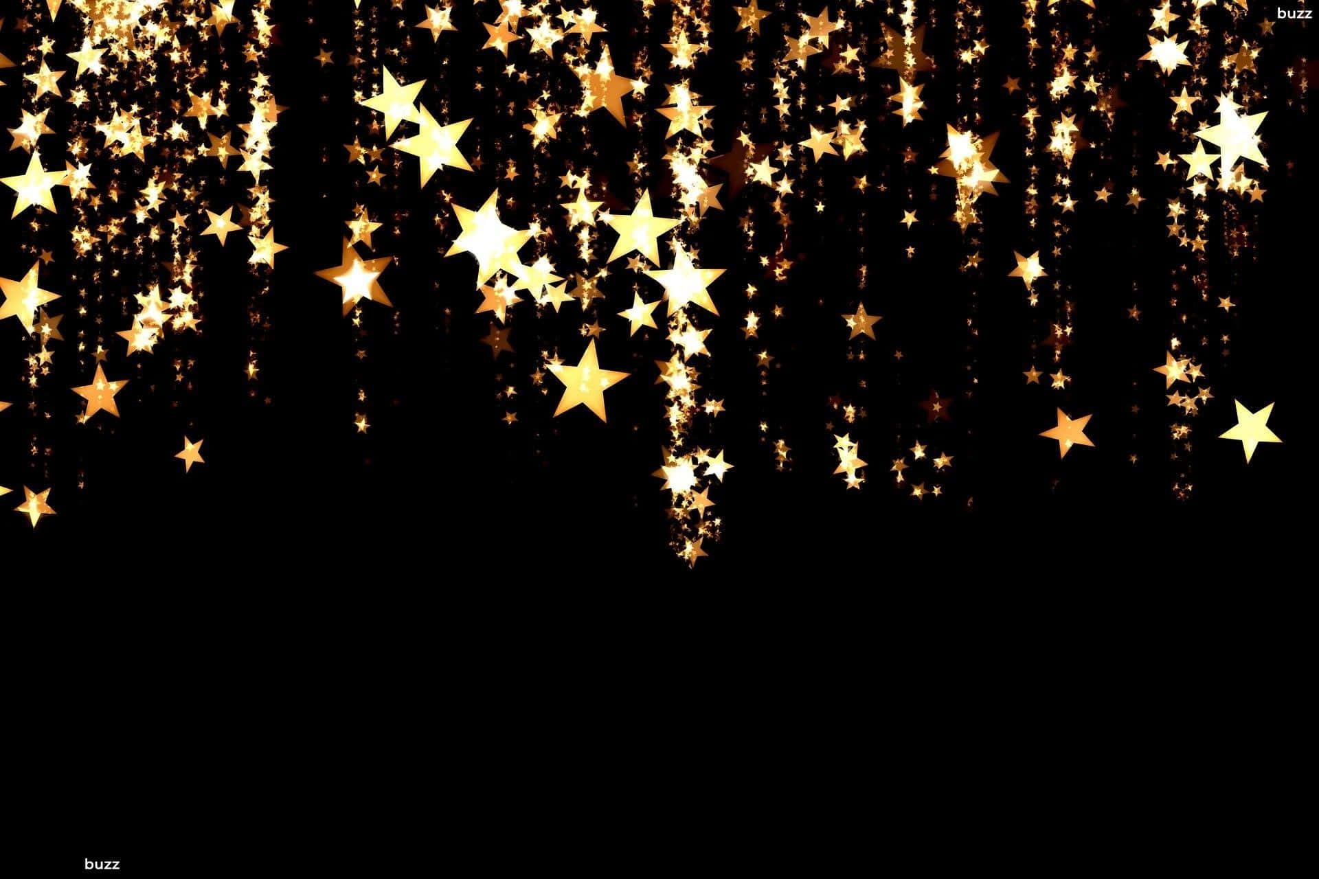 A Rain Of Golden Stars Cascades Through The Night Sky, Shining Bright In The Darkness. Background
