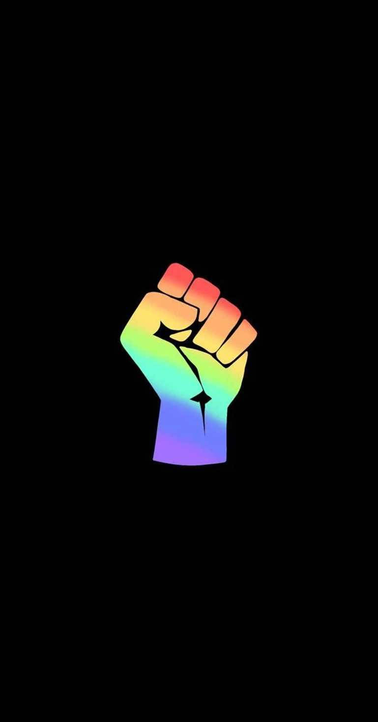 A Rainbow Fist On A Black Background Background