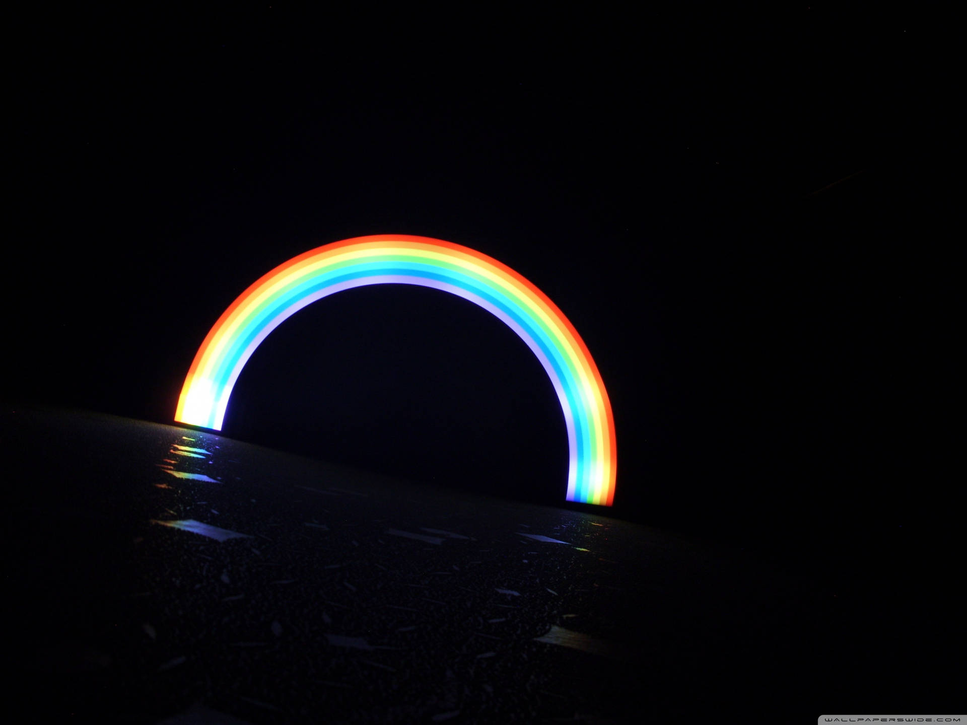 A Rainbow In The Dark Background