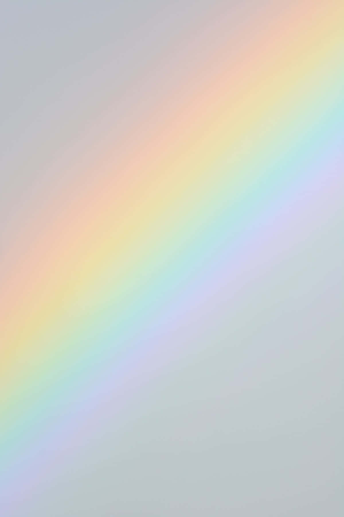 A Rainbow Is Shown On A Gray Background Background