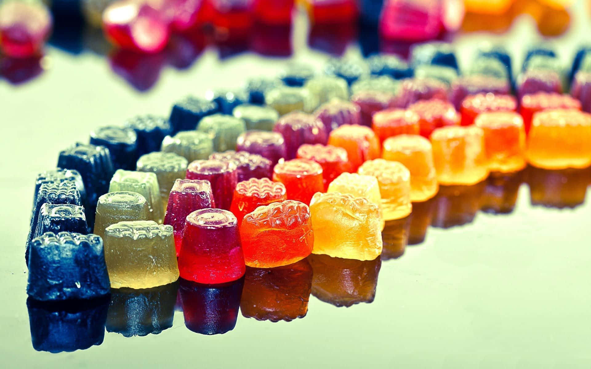 A Rainbow Of Gummy Bears Background