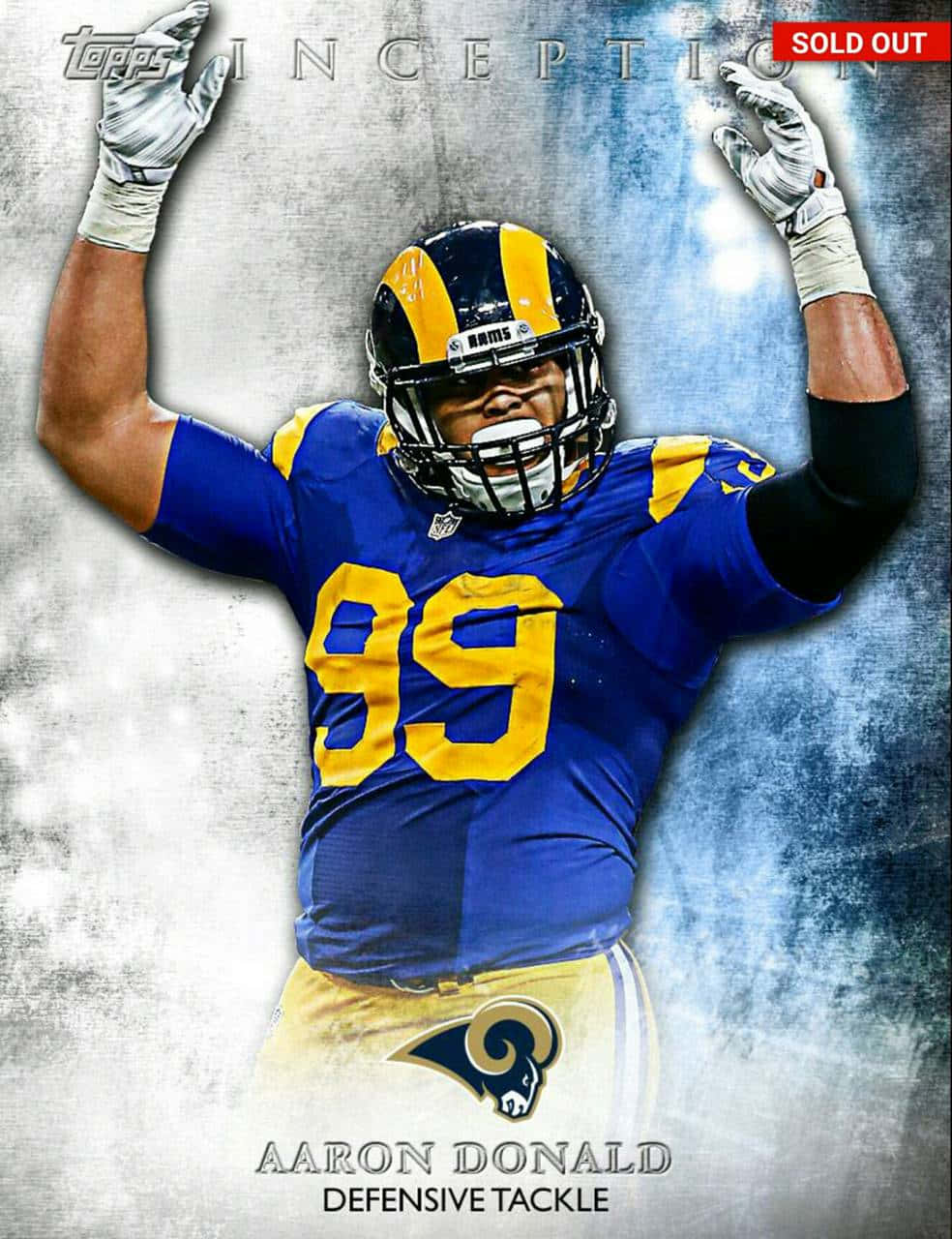 A Rams Football Player Is Holding Up His Arms Background