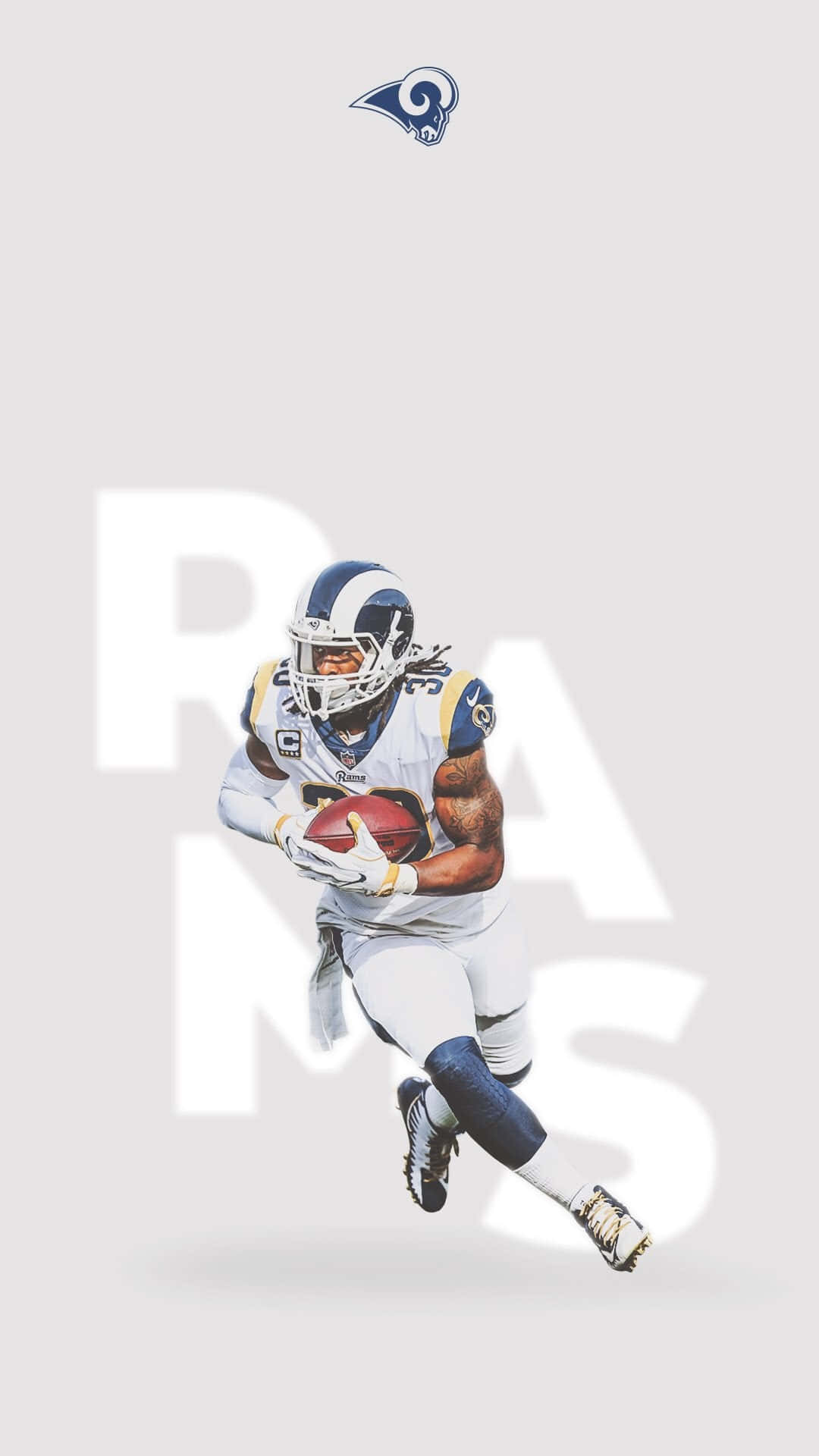 A Rams Player Running With The Ball Background