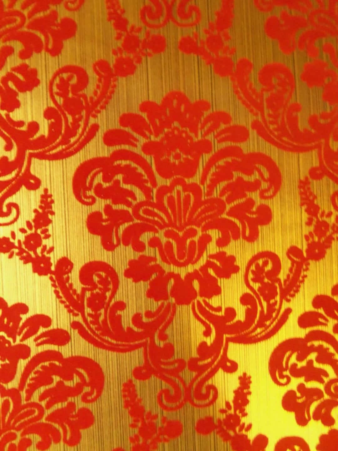 A Red And Gold Damask Wallpaper Background