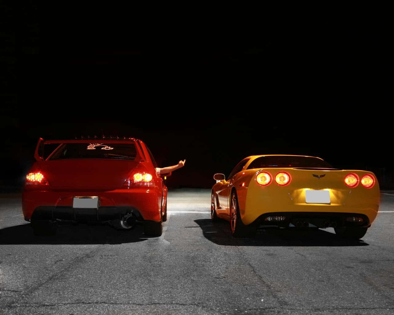 A Red And Yellow Sports Car Background