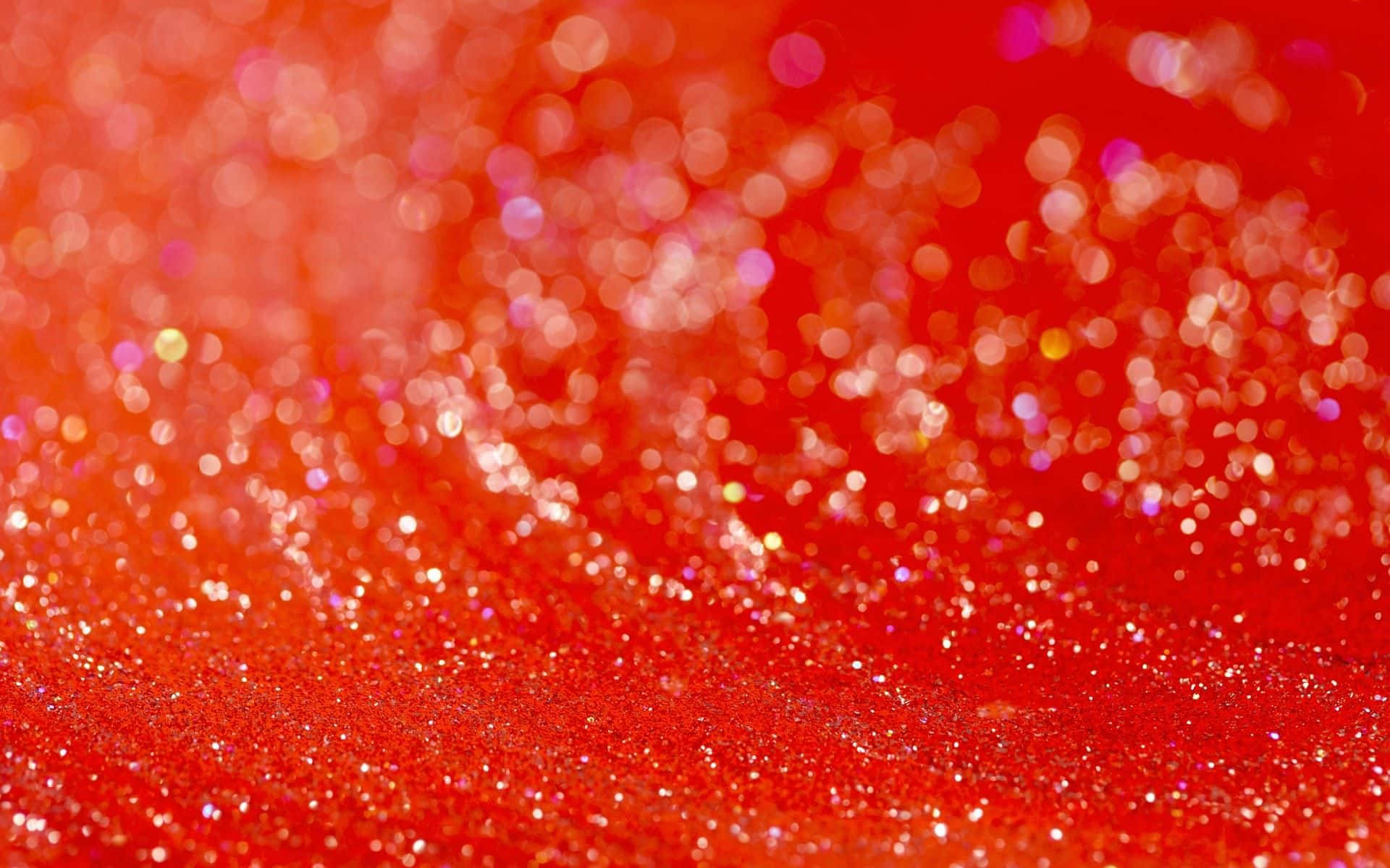 A Red Background With A Lot Of Sparkles