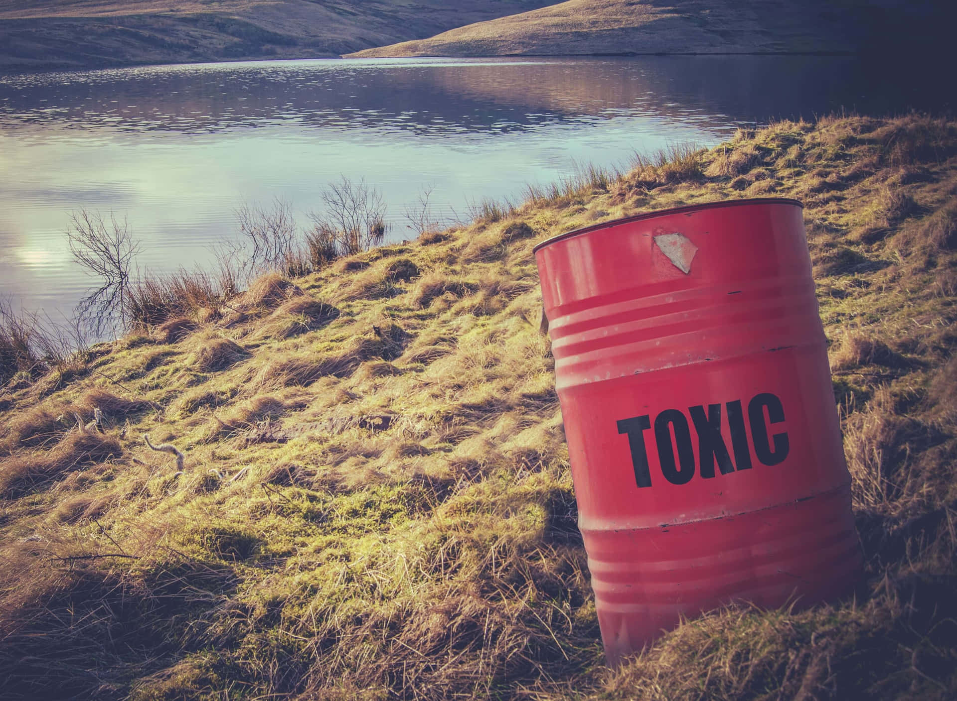A Red Barrel With The Word Tonic On It