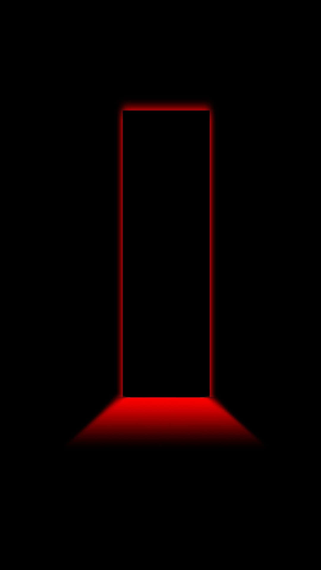 A Red Door In A Dark Room Background