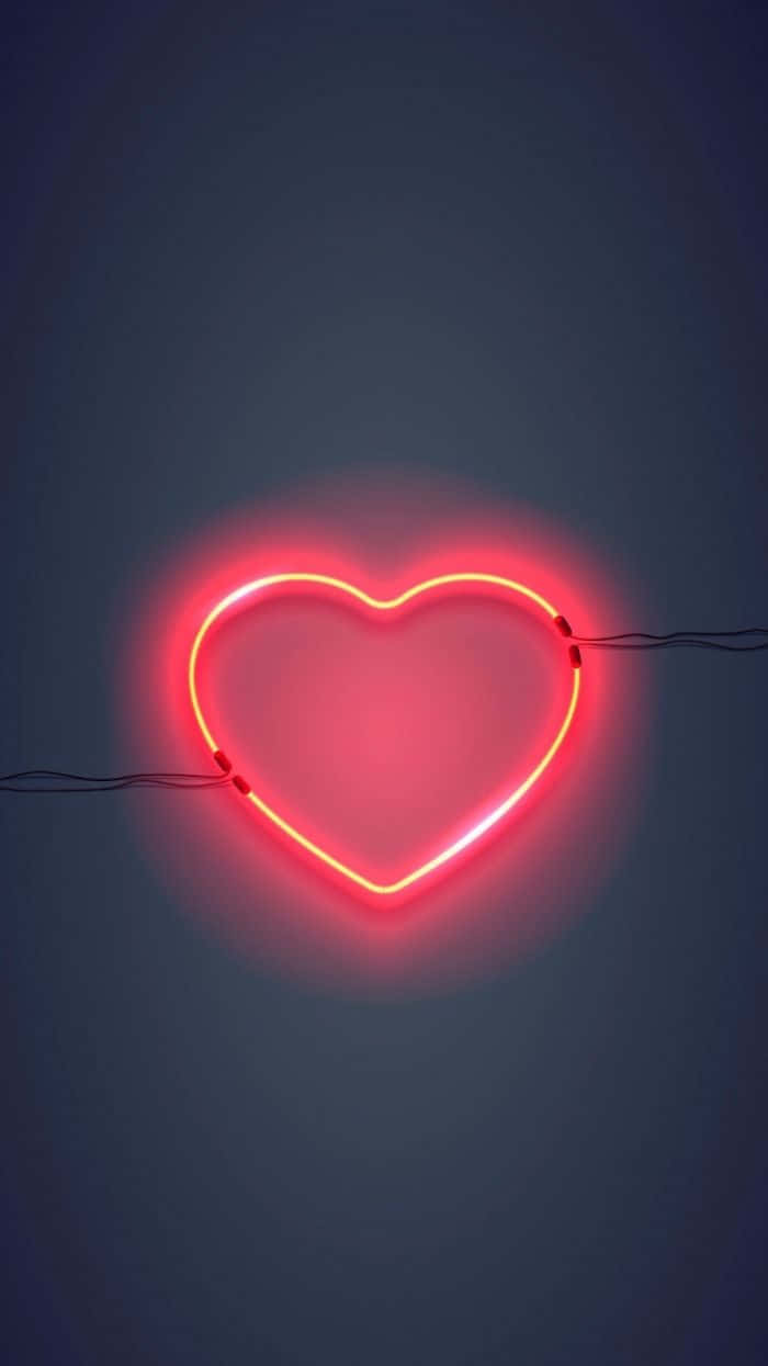 A Red Heart Neon Sign On A Dark Background Background