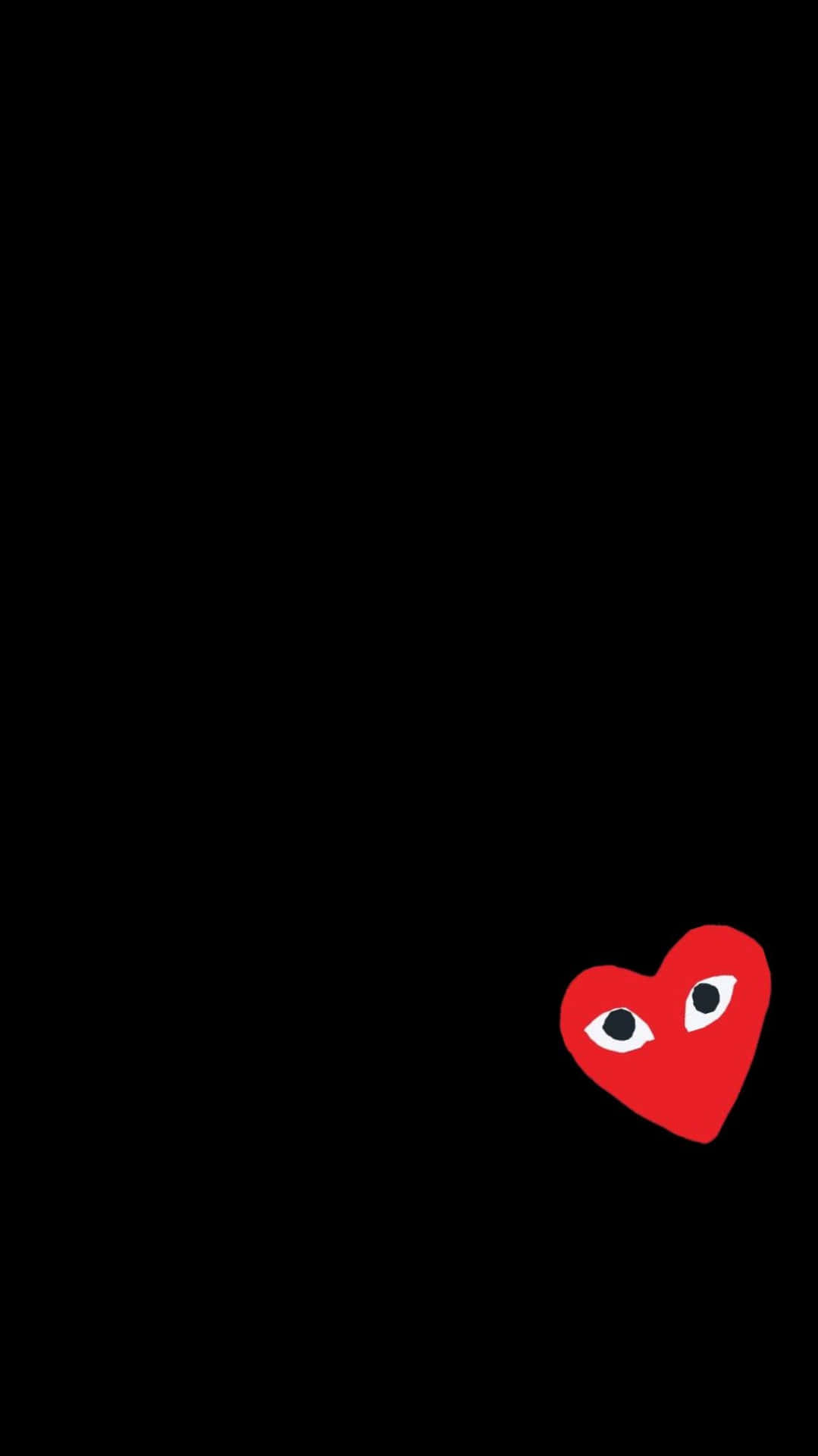 A Red Heart With Eyes On A Black Background