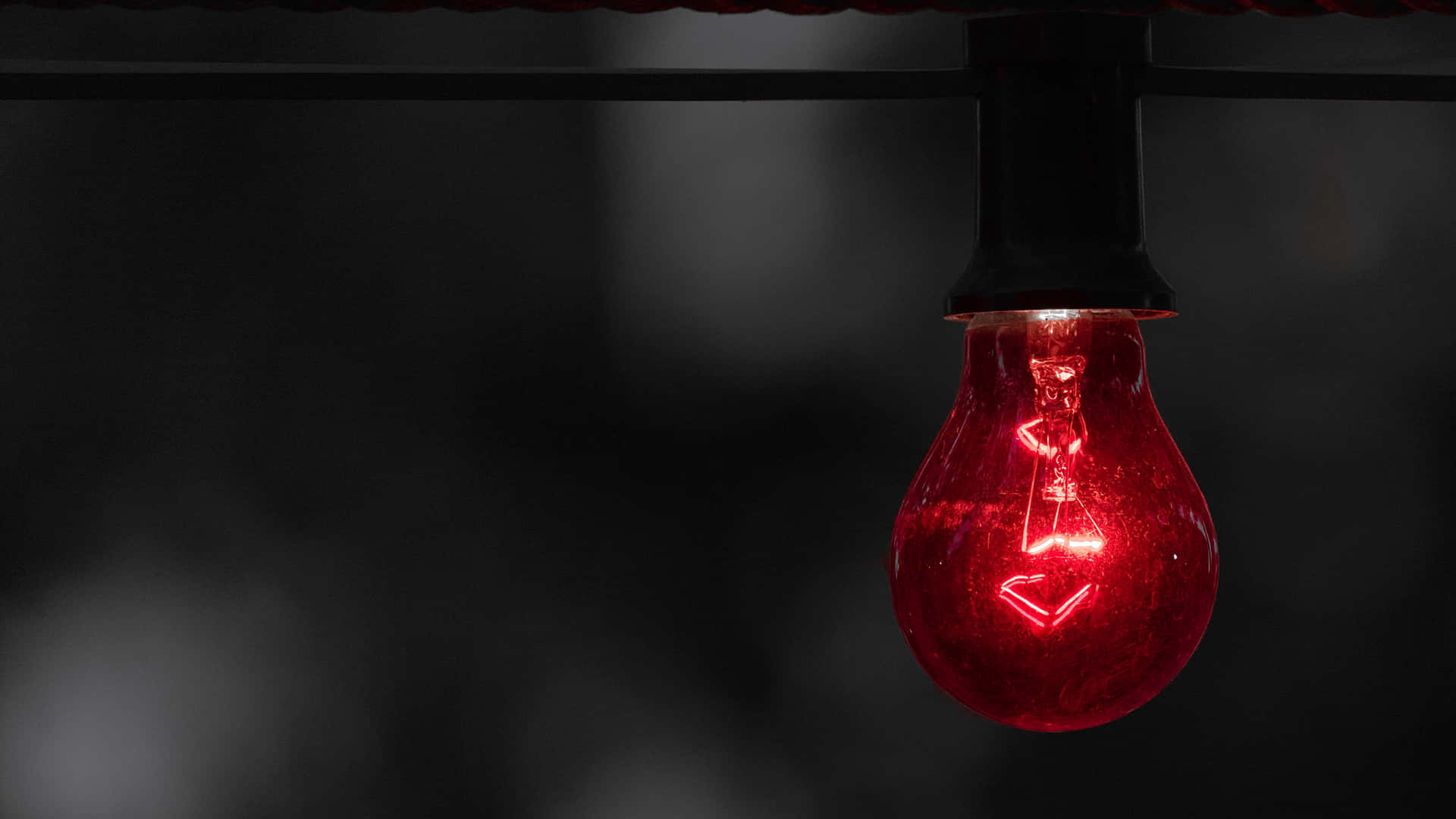 A Red Light Bulb Background