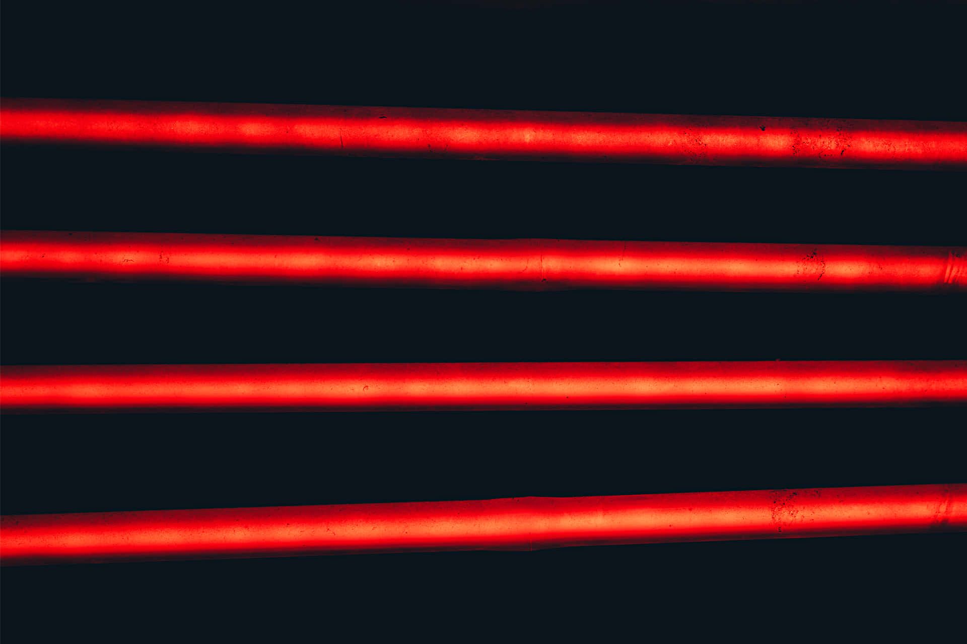 A Red Line Cascades Through The Night Sky Background