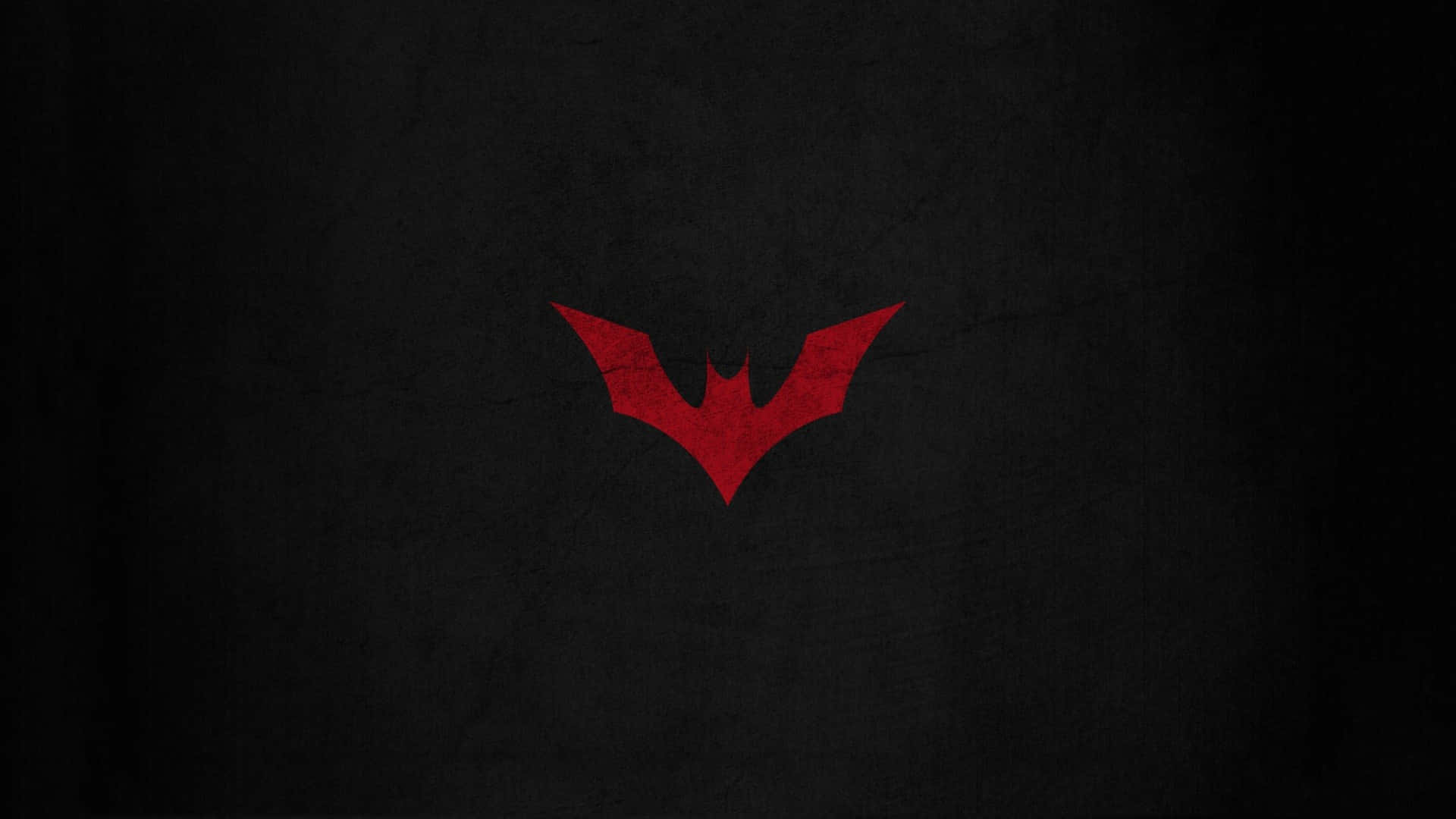 A Red Logo On A Black Background Background
