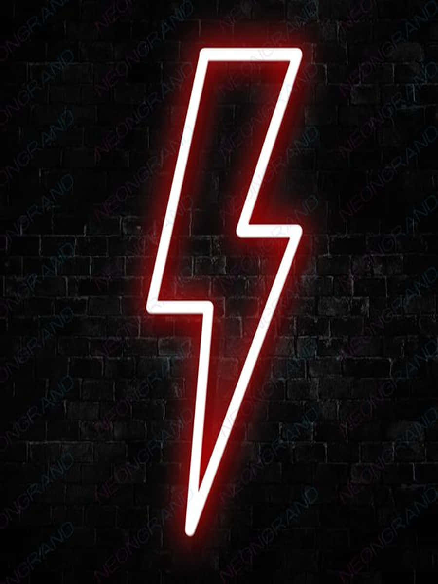 A Red Neon Lightning Bolt Sign On A Brick Wall Background