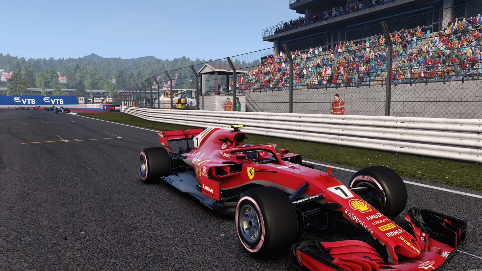 A Red Racing Car On A Track Background