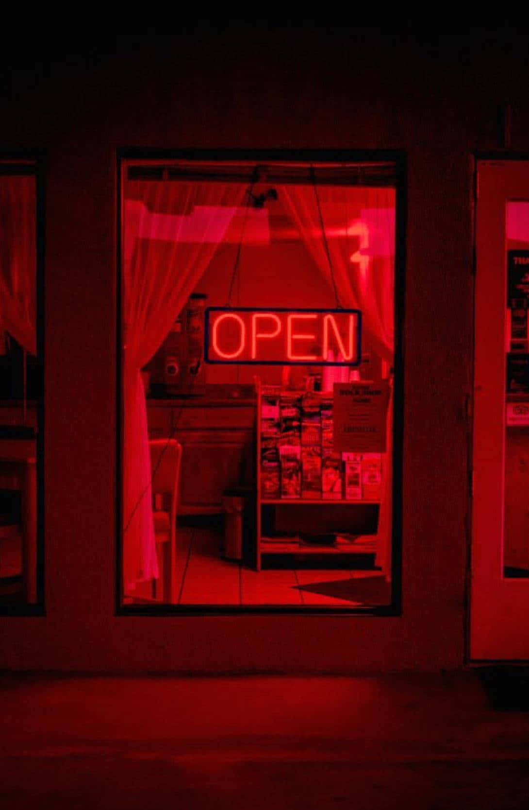 A Red Sign In A Window