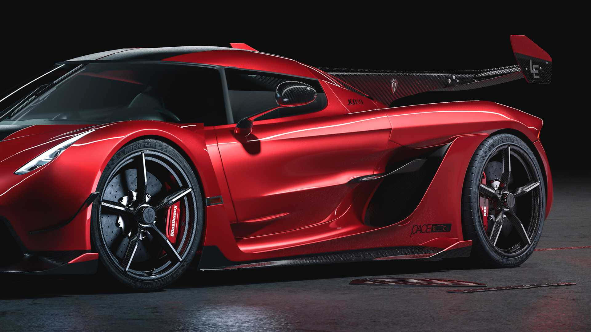 A Red Sports Car Is Shown In A Dark Room Background