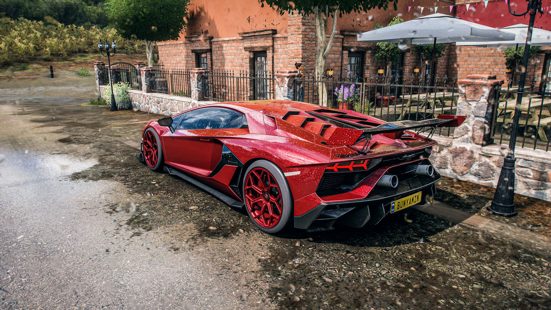 A Red Sports Car Parked In Front Of A Restaurant Background