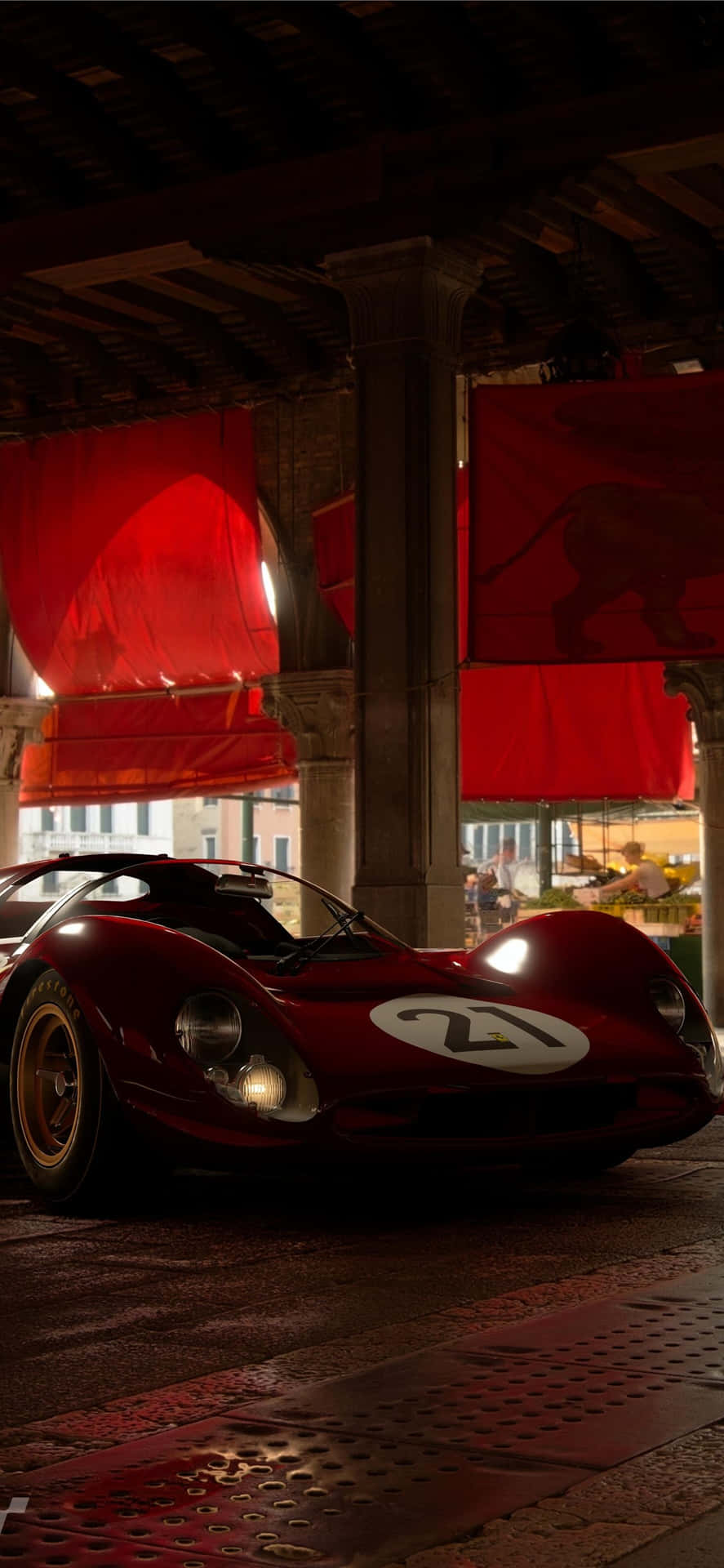 A Red Sports Car Parked Under A Red Canopy