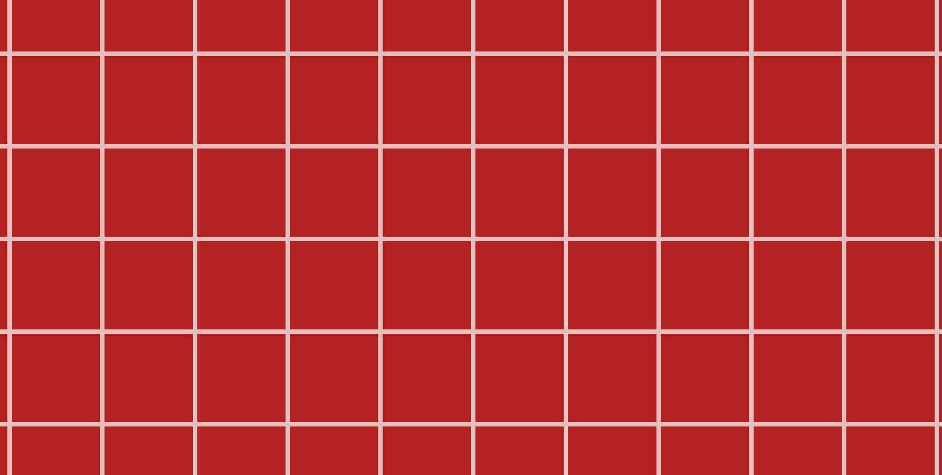 A Red Tile With Squares On It