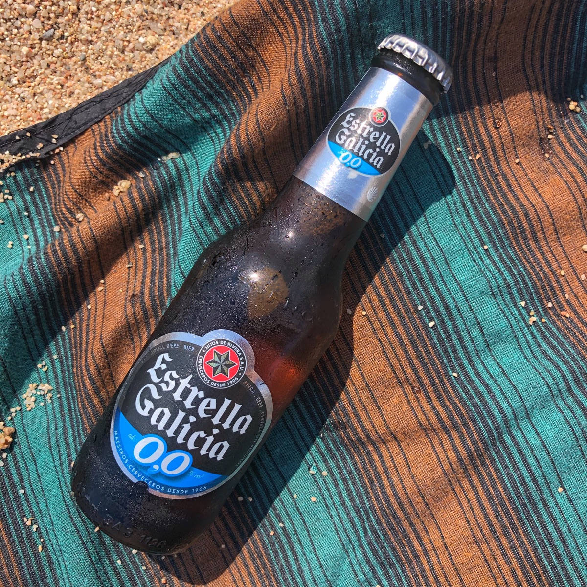 A Refreshing Bottle Of Estrella Galicia Non-alcoholic Beer Background