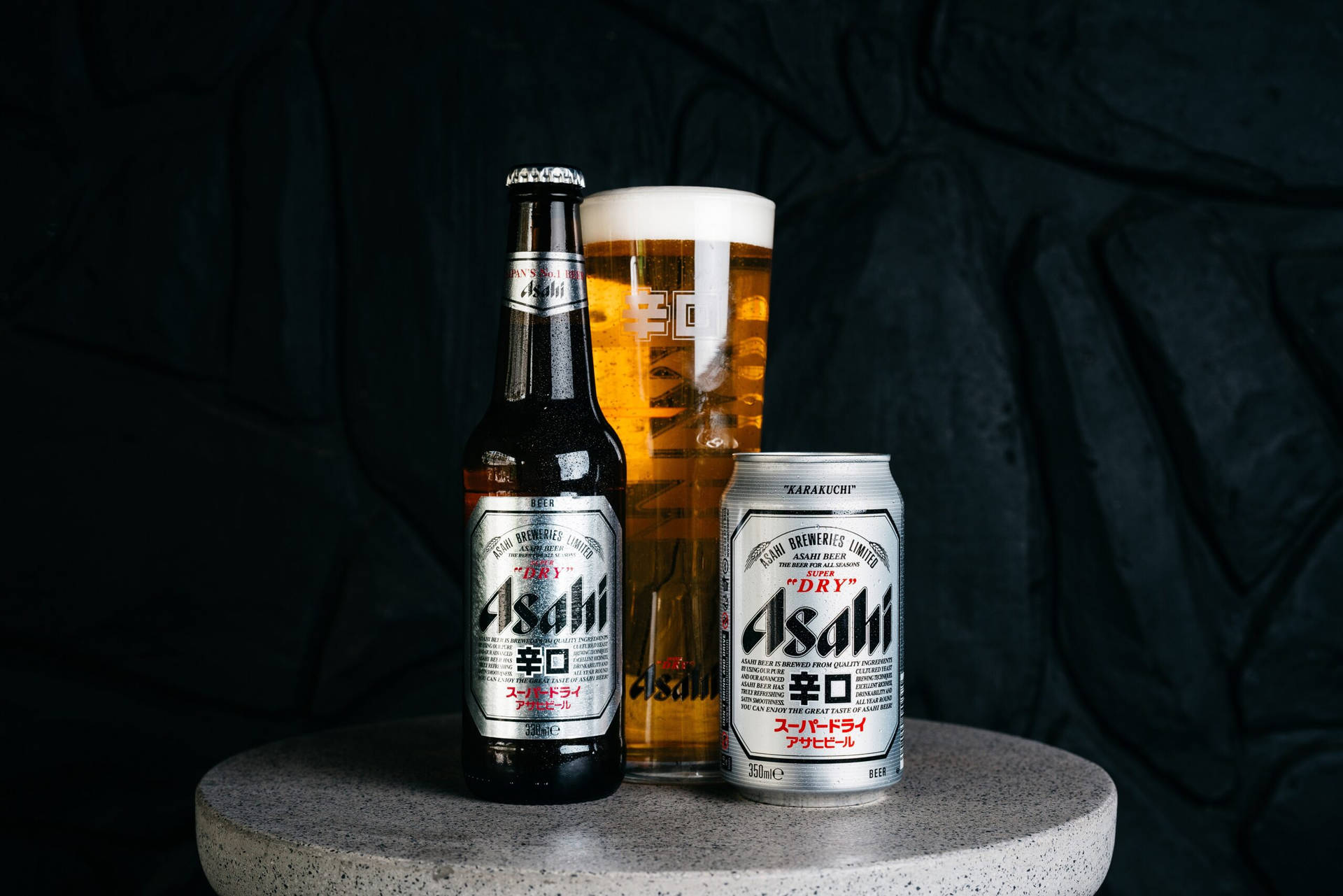 A Refreshing Sip - The Asahi Super Dry 330ml Bottle Background