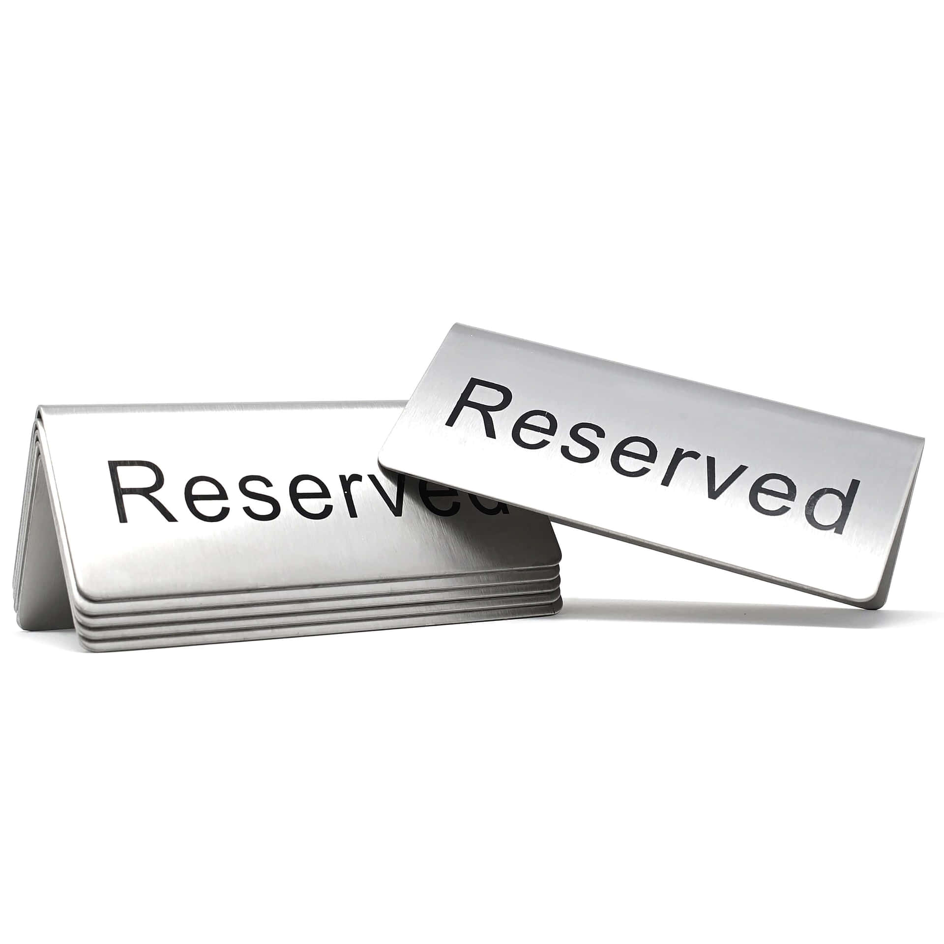 A Reserved Table Sign On A Restaurant Dining Table Background