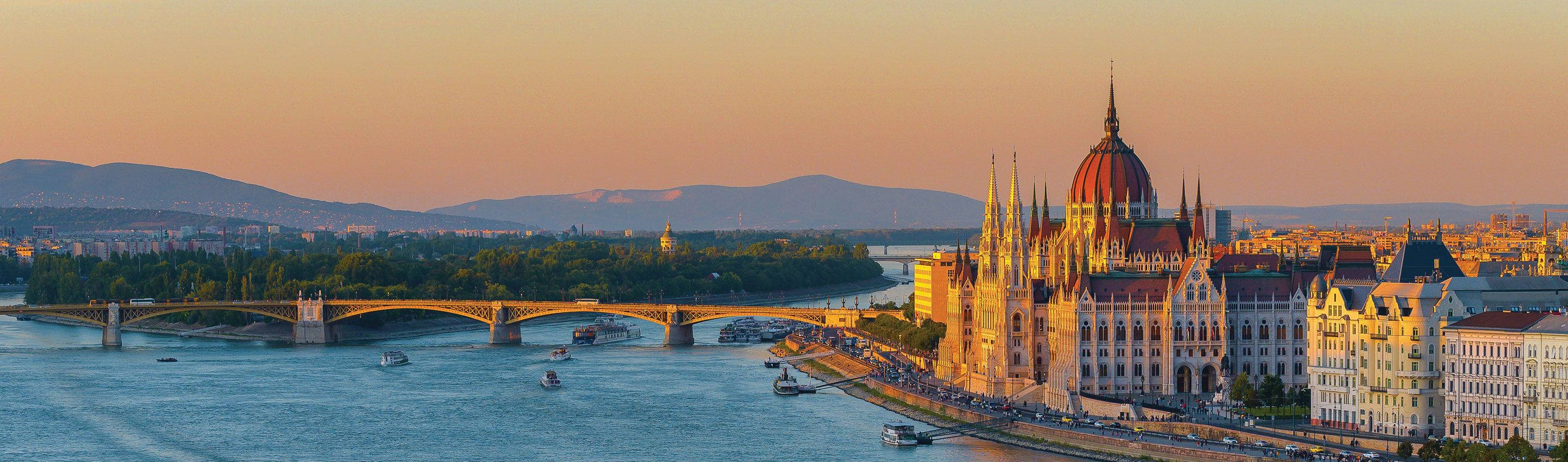 A River With Buildings And Boats