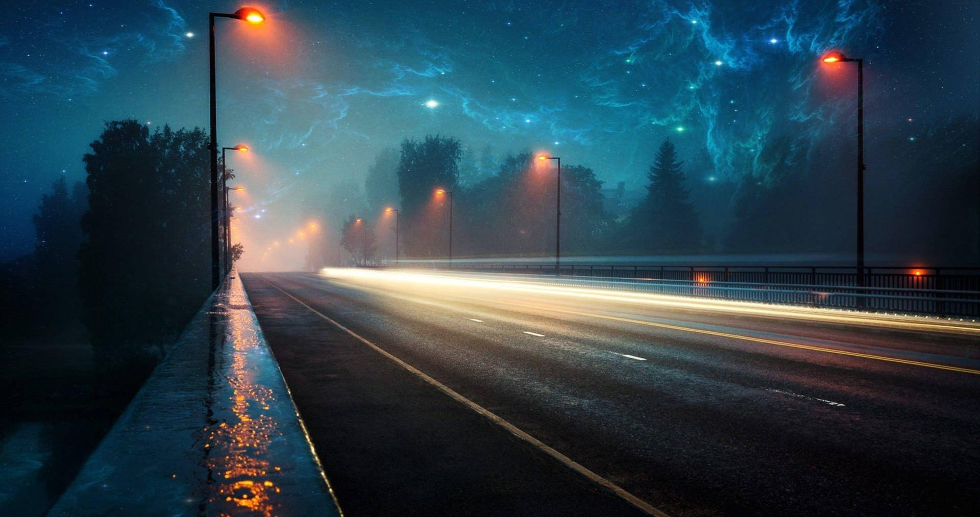 A Road With Lights And Stars In The Sky Background